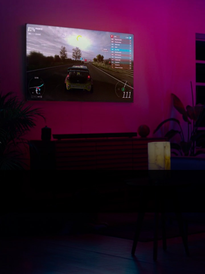 Play a video game on the TV at home after using Bixby to set lighting and sound