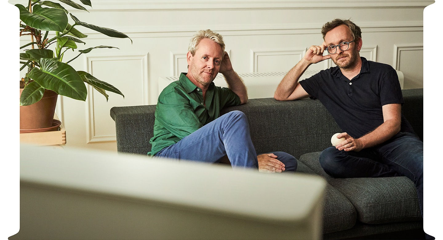 French furniture designers, the Bouroullec brothers Ronan and Erwan watch 2019 The Serif in a modern style living room.