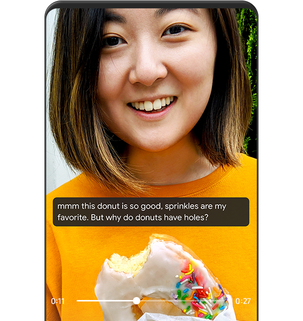 Subtitles are provided in real time in the video, a woman is holding a donut.