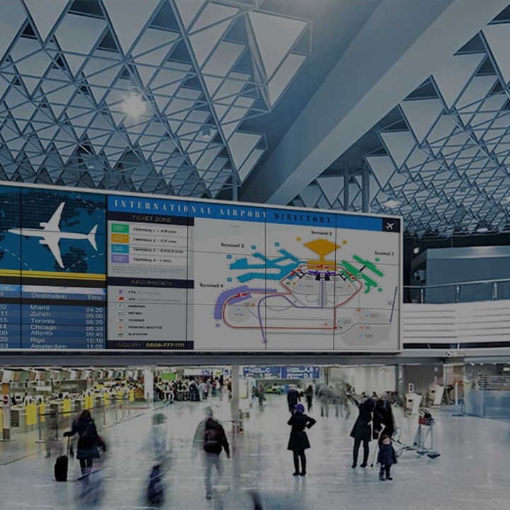 A large video wall displaying various flight information