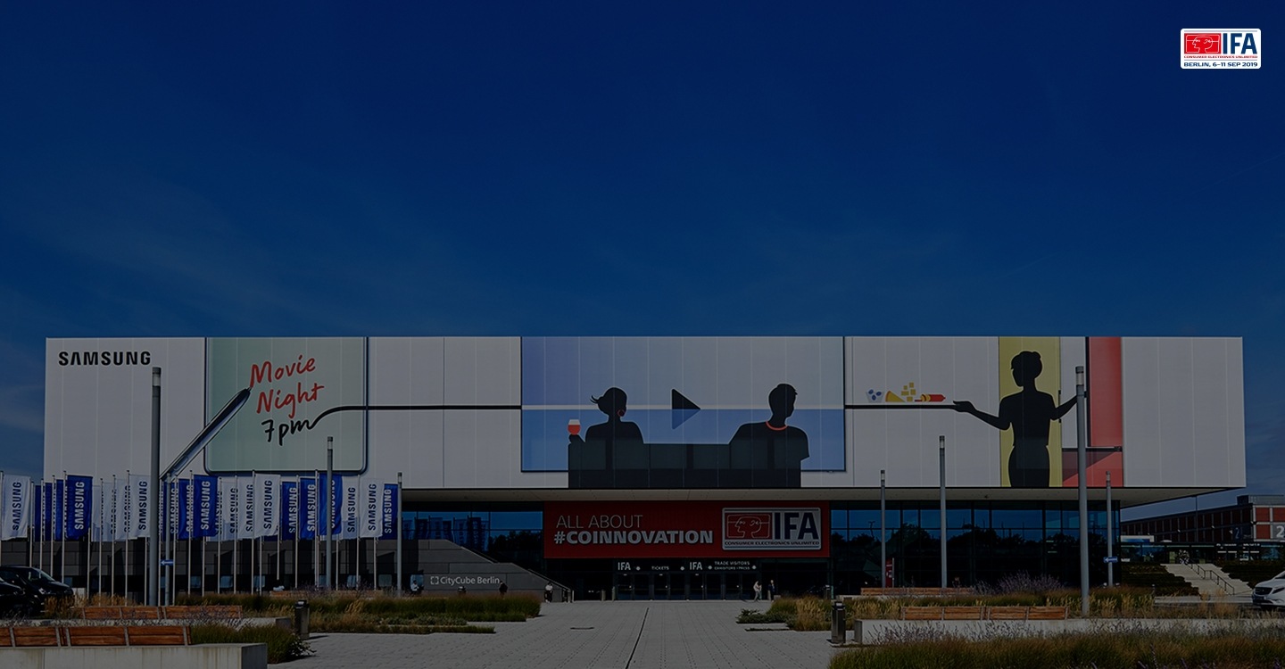 Exhibition building exterior bearing the Samsung logo in the upper left corner and a IFA banner in the façade