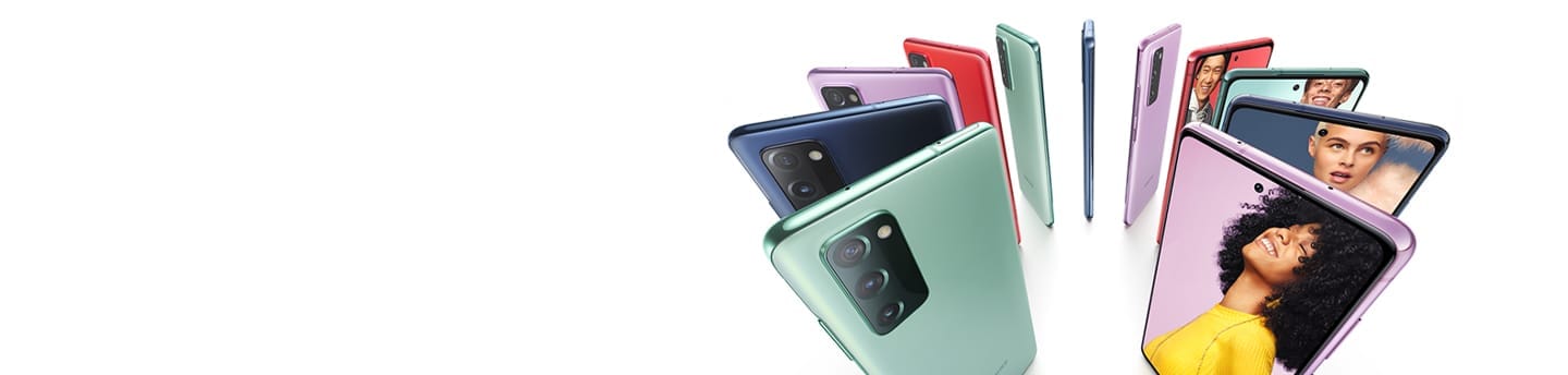 Eleven Galaxy S20 FE phones standing upright in a circle, alternating Cloud Navy, Cloud Red, Cloud Lavender, and Cloud Mint. Some are seen from the rear and some are seen from the front, with photos of people onscreen. Each person stands against a color background that matches the color of the phone.