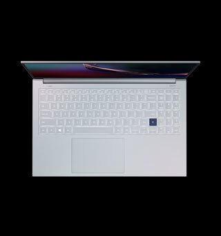 A white Samsung 15 inch Galaxy Book Ion tablet laptop stood open in front of a black background pictured from above A white Samsung 15 inch Galaxy Book Ion tablet laptop stood open in front of a black background pictured from above
