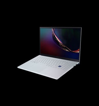 A white Samsung 15 inch Galaxy Book Ion tablet laptop stood open with screen facing forwards in front of a black background A white Samsung 15 inch Galaxy Book Ion tablet laptop stood open with screen facing forwards in front of a black background