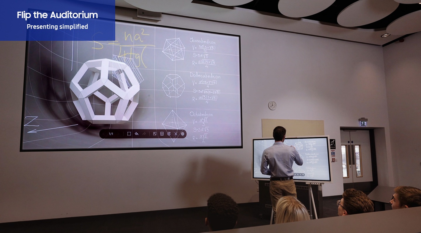 In the auditorium, Samsung Flip 2 provides a big screen sharing so that a presentation to big audience is possible. A teacher gives a lecture to students with Flip 2 that is connected to a big screen.