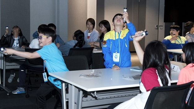 A photo of childern participating the PlanetFirst Green School
