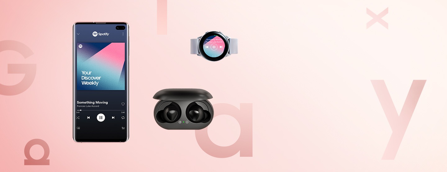 Galaxy S10 streaming a song using Spotify next to two devices it is paired to: Galaxy Watch Active in silver with a similar interface to the phone and streaming the same song, and Galaxy Buds in black with a green pinpoint light indicating the paired status.