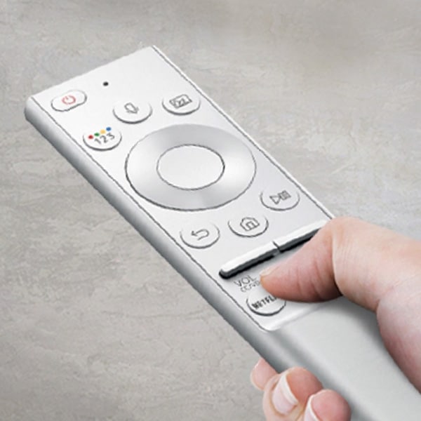 A person holding the One Remote control