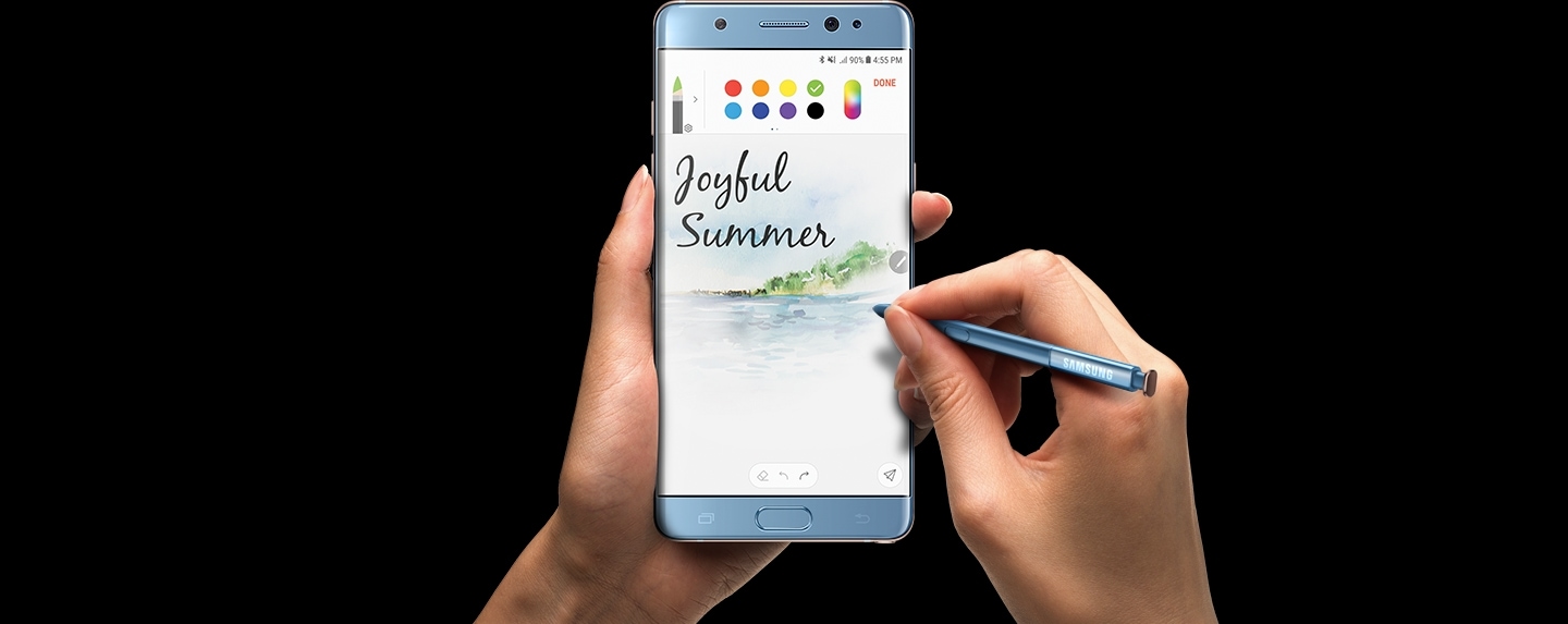 Left Hand clutching the Galaxy Note FE Black Onyx with S Pen drawing and painting
