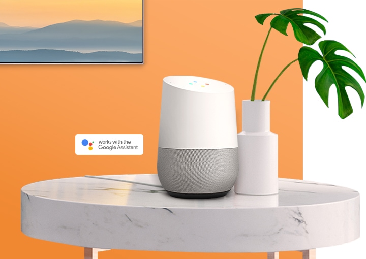 Google Assistant displayed on a white table, connected to a 2019 Samsung Smart TV.