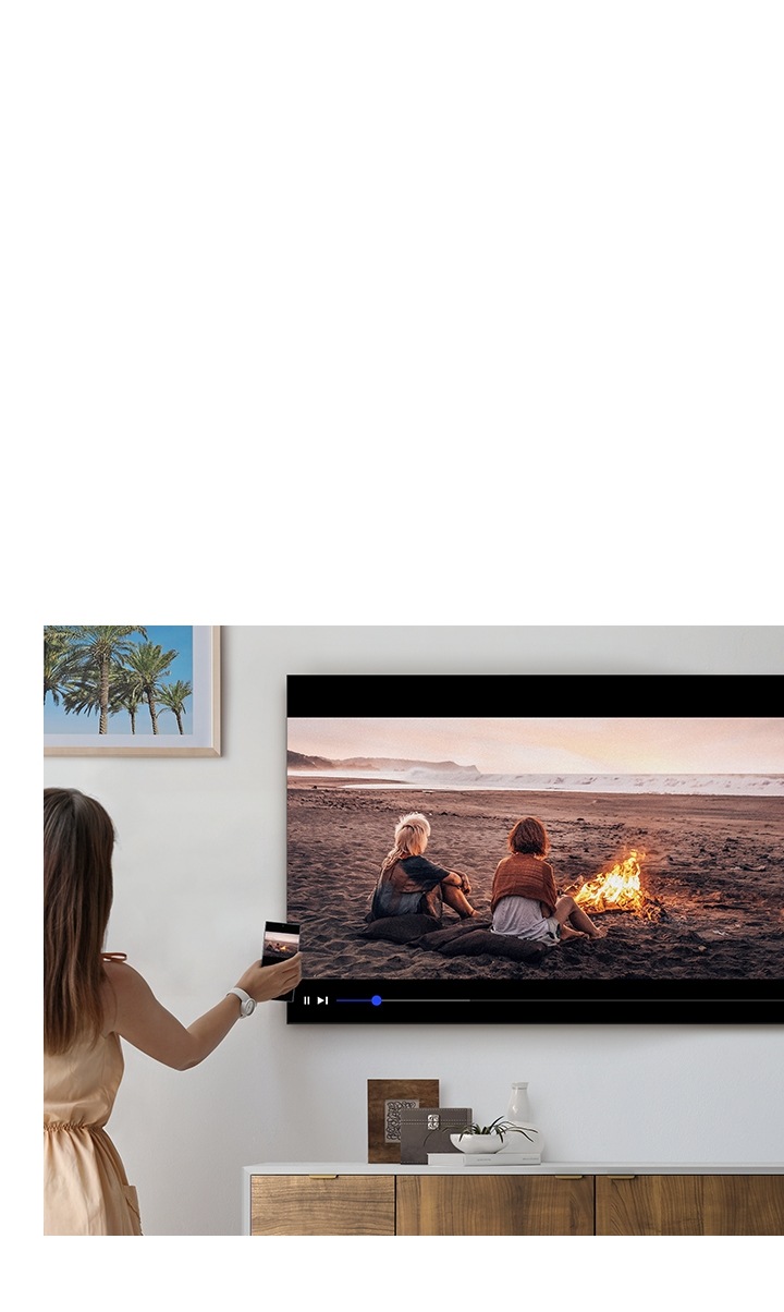 Mirroring movies or music from your smartphone to TV is as simple as a tap. When you tap TV with your smartphone, the TV senses the tap and mirrors automatically. So it's quick and easy to switch to the TV and continue enjoying your favorite content.