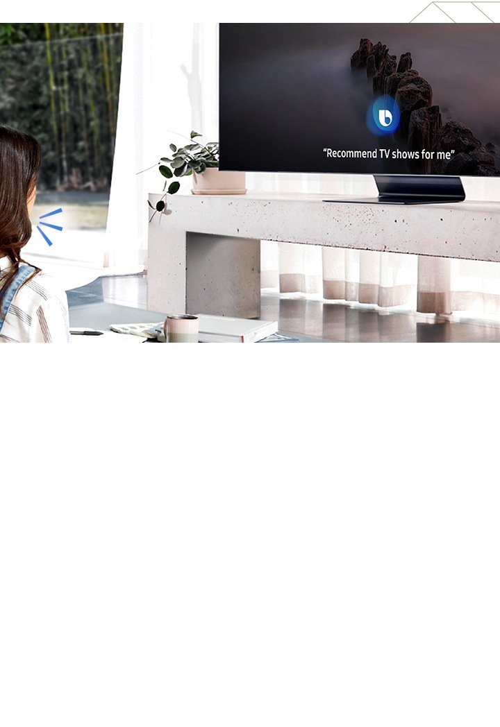 Le téléviseur QLED Samsung est équipé d’un assistant vocal appelé Bixby. Parlez directement au téléviseur QLED, Bixby reconnaît la conversation. L’écran du téléviseur affiche « Me recommander des programmes TV ».