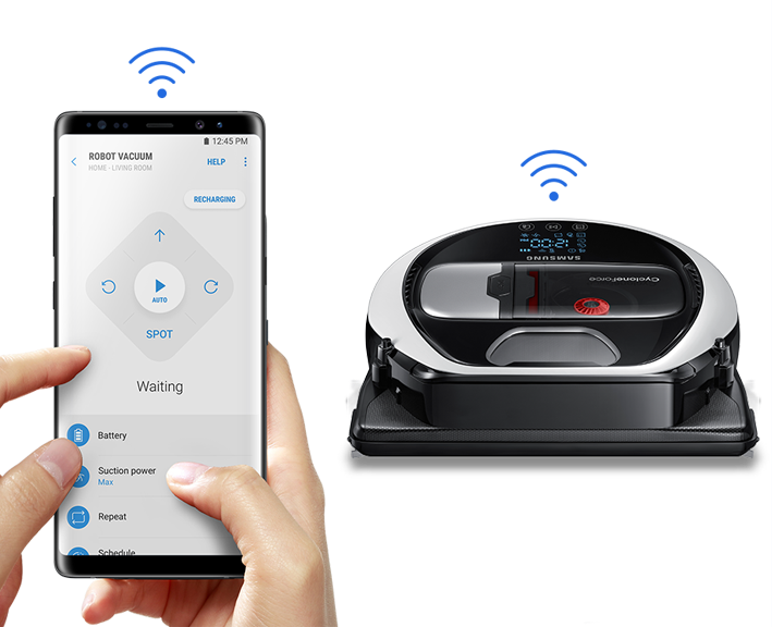 A robot vacuum is connected to a mobile phone. A control system of the robot vacuum is on the mobile phone screen.