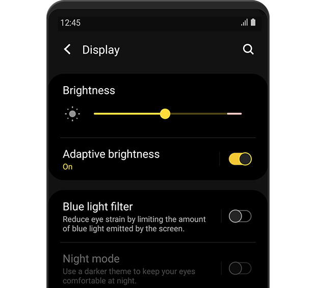 The 'Display' menu is displayed. Adaptive brightness is turned 'on'.
