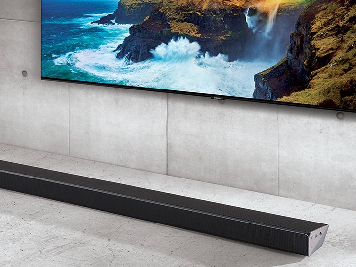 Q Series A Q Series soundbar with a QLED television.