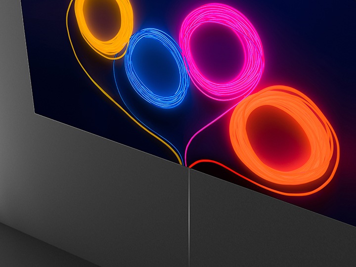 A Samsung QLED TV and the One Clear Connection cable.