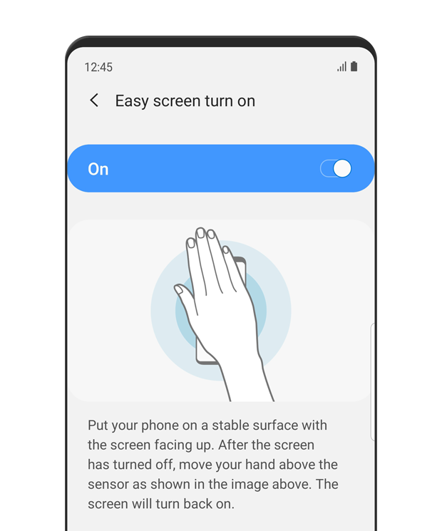 The 'Easy screen turn on' menu is displayed. Easy screen turn on is turned 'on'. The menu shows a simulated image of a cellphone with a person's right hand placed over it.