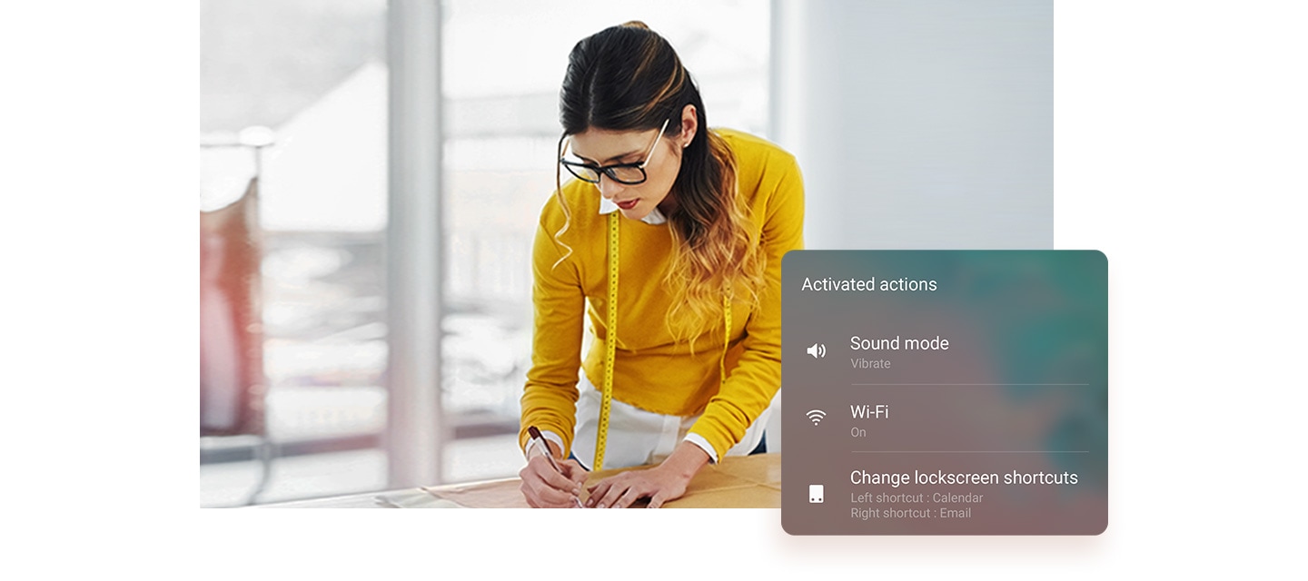 Image of woman measuring a pattern in her office. On the side is the Activated actions window and it says Sound mode vibrate, Wi-Fi on, and Change lock screen shortcuts to Left shortcut: Calendar and Right shortcut: Email