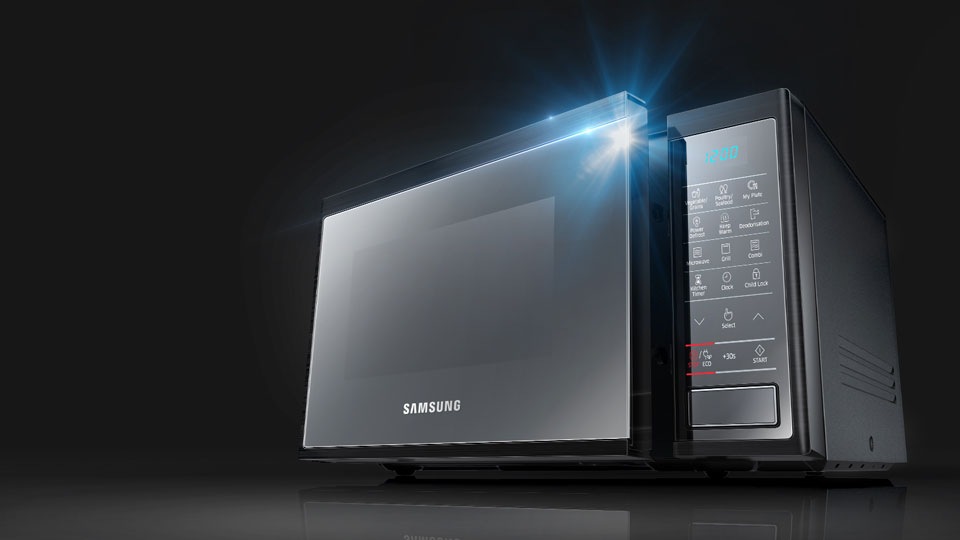Kuchenka mikrofalowa Samsung z technologią Power Defrost i podkreślonym wyświetlaczem LED w kolorze Ice Blue. Kuchenka mikrofalowa Samsung z technologią Power Defrost i podkreślonym wyświetlaczem LED w kolorze Ice Blue.