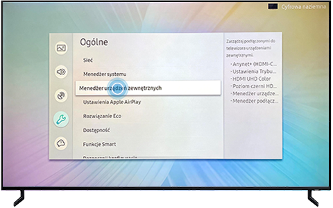 Wybierz pozycję „Menedżer urządzeń zewnętrznych” w menu „Ogólne” na telewizorze smart Samsung