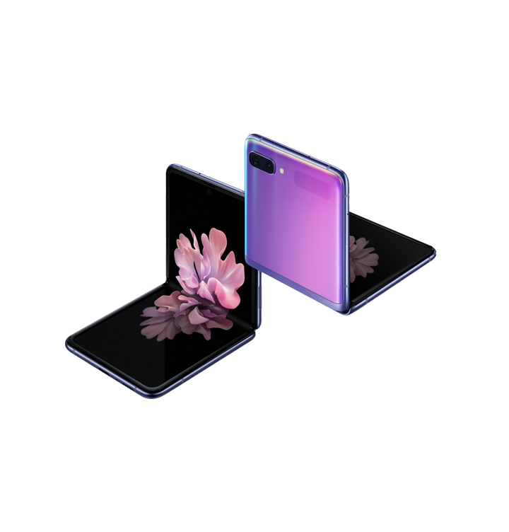 Galaxy Z Flip Two Galaxy Z Flip phones in Mirror Purple at a three-quarter angle, one seen from the front and one seen from the rear. Both are folded at right angles with freestop folding. The one seen from the front has the blossoming flower wallpaper onscreen