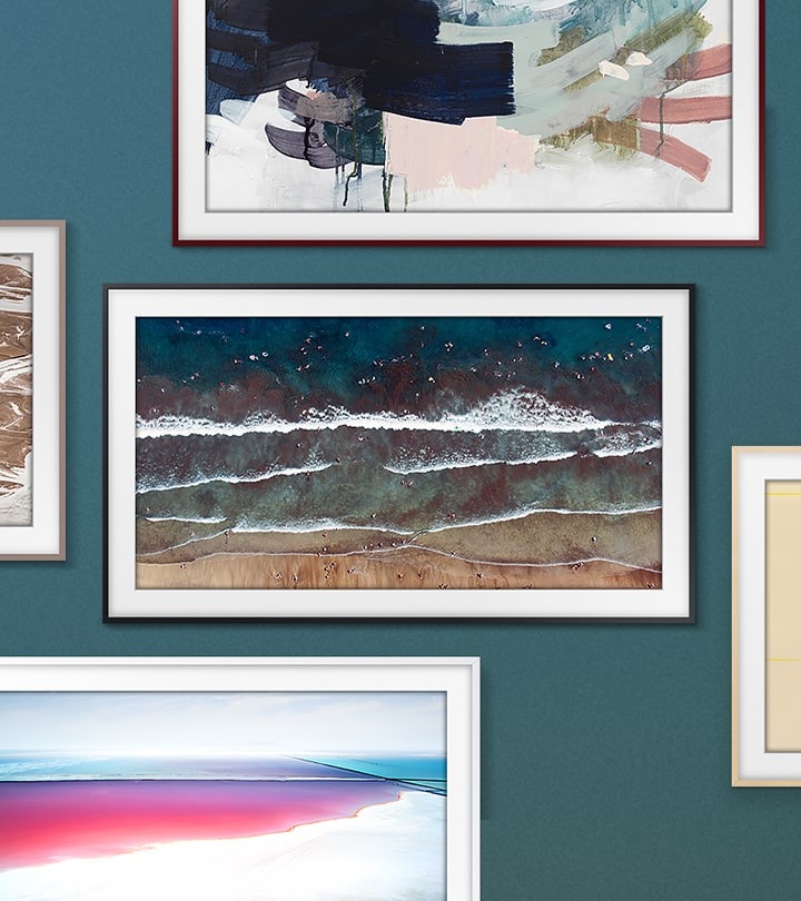 The 2020 The Frame TV seen mounted on the wall surrounded by artworks in different color frames to show the The Frame TV's customizable bezel lets you choose the right one for your interior.