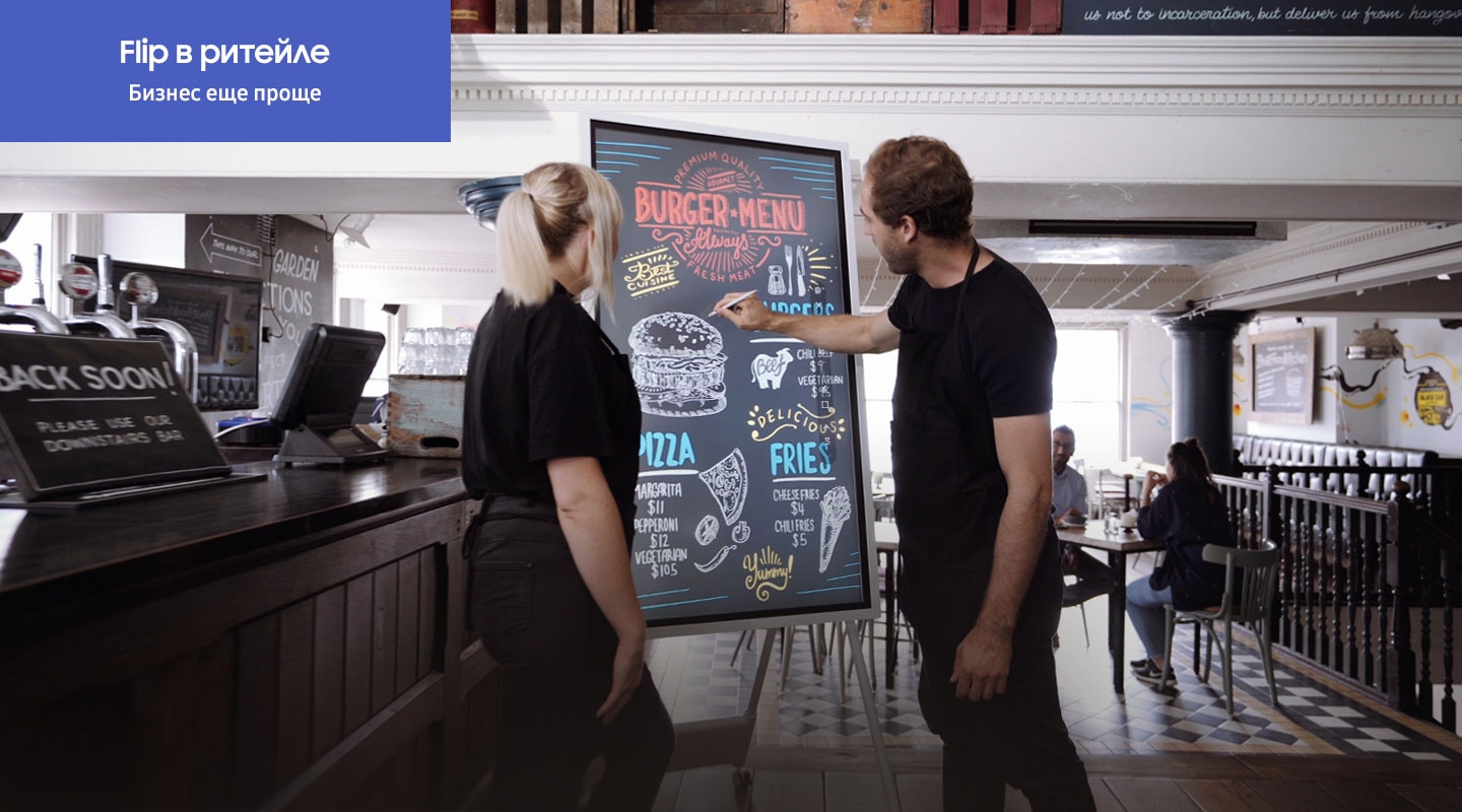 Flip 2 in the retail store that can simplify your business. Clerks are completing the menu board with a Flip 2 in the restaurant and a customer orders a food by seeing Flip 2 and gets her food.