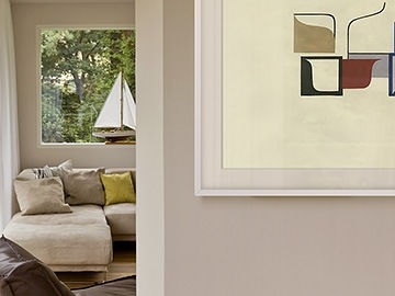 The Frame on the wall next to entrance to living room.