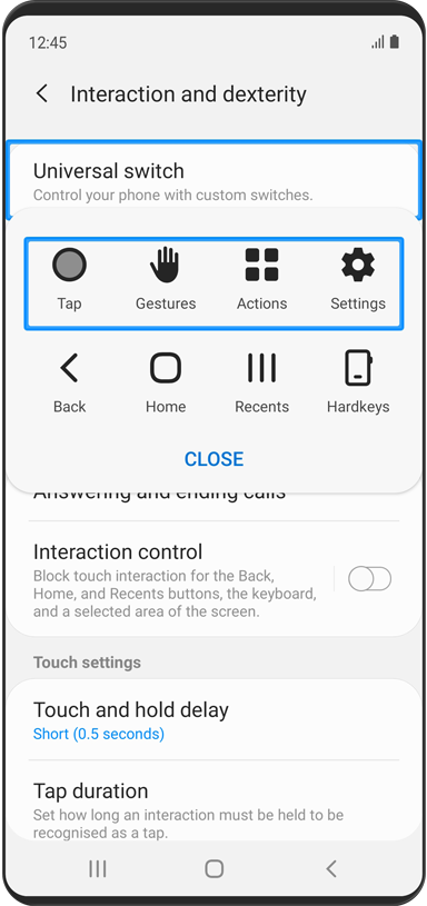The action menu pop-up for the 'Universal switch' menu is displayed. The focus is on the Tap, Gestures, Actions, and Settings icons.
