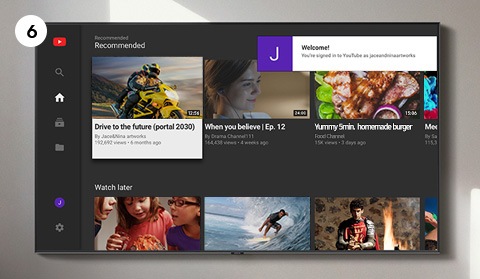 Lær hvordan du aktiverer YouTube på en Samsung Smart TV. Det siste av 6 steg er å bare se og nyte videoene på Smart TV-en. Du får opp en velkomstmelding med ditt personlige symbol i hjørnet, som angir at påloggingen er fullført.
