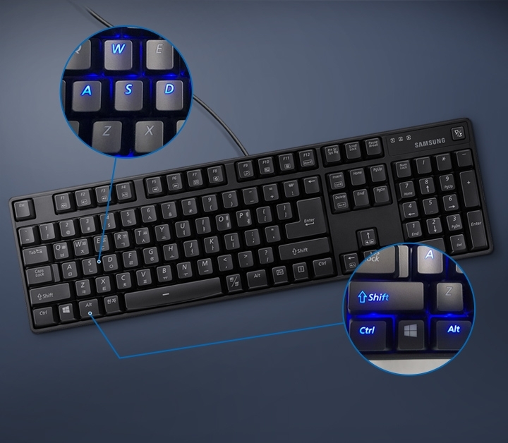 블랙 컬러 게이밍 키보드의 왼쪽 W,A,S,D 키캡과 Shift,Ctrl,Alt 키캡이 확대된 이미지