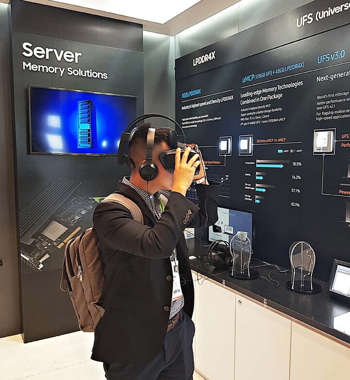 Samsung Semiconductor's Server - Memory Solutions booth at CES 2018; A man is wearing a VR headset