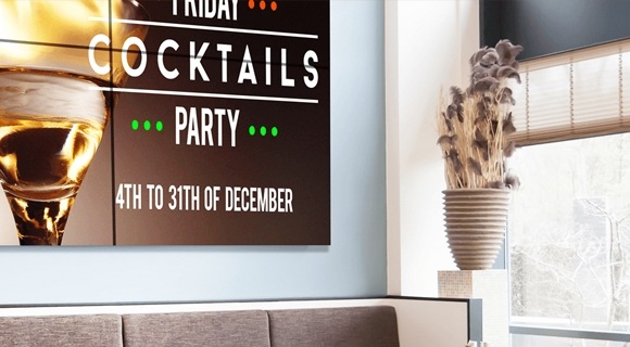 A Samsung outdoor display device showing a lounge bar event information