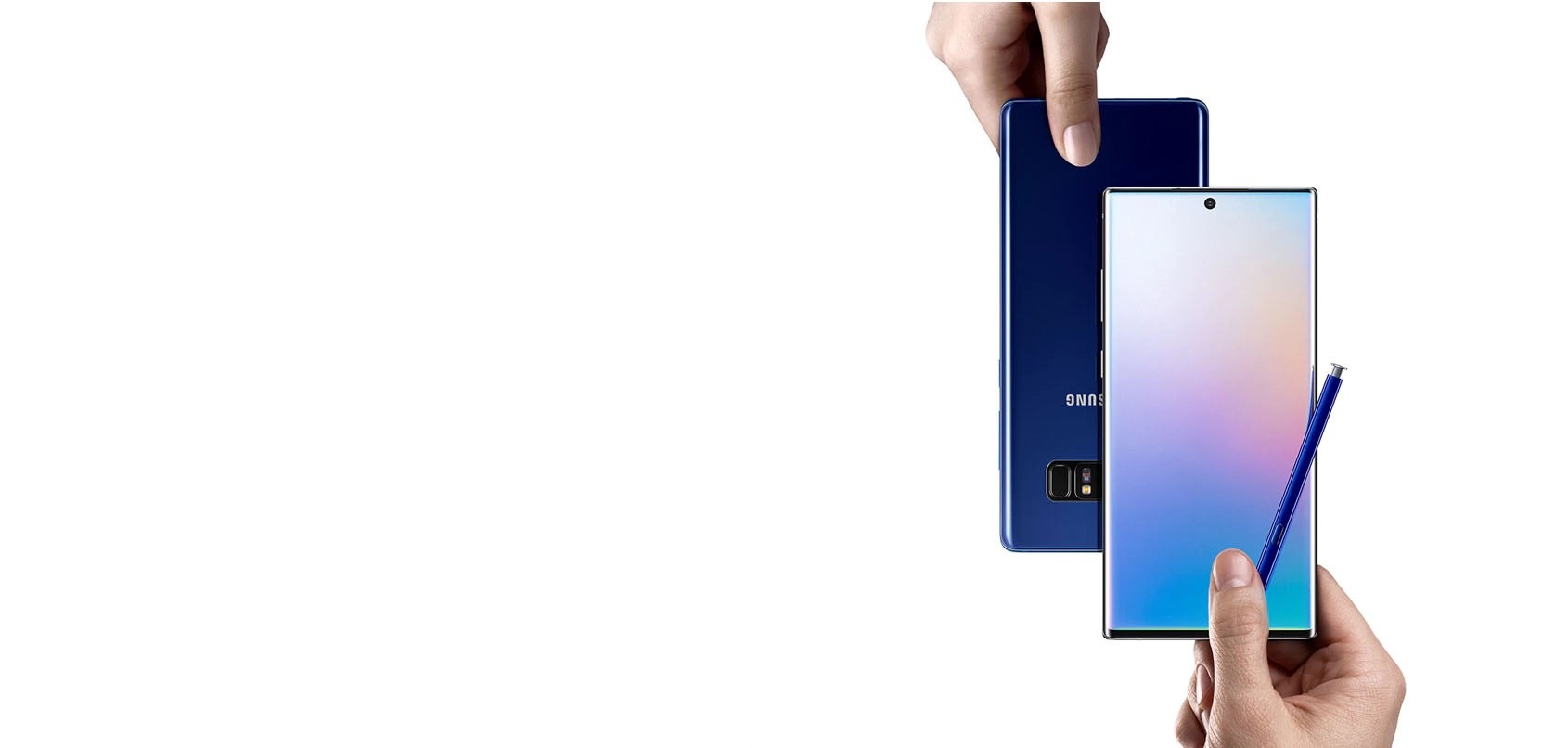 Two hands exchange Galaxy phones over a white background.