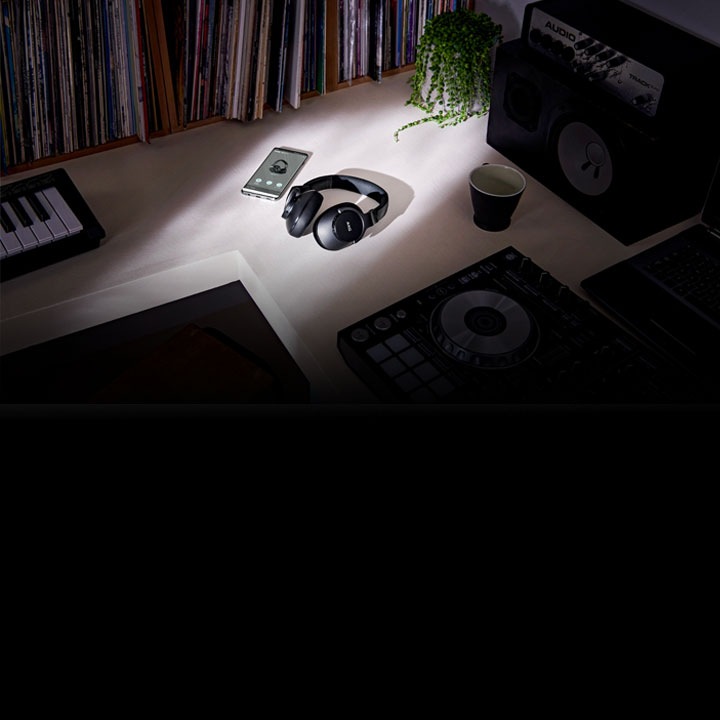 Over-ear AKG N700NC wireless headphones in a studio