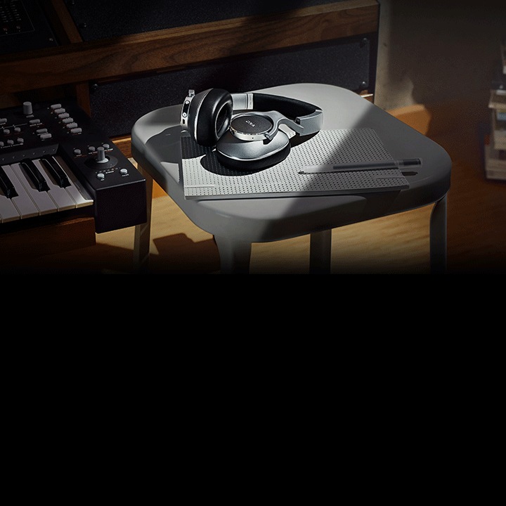Over-ear AKG N700NC wireless headphones in a studio