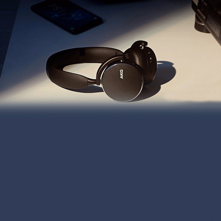 On-ear AKG Y500 wireless headphones on a desk