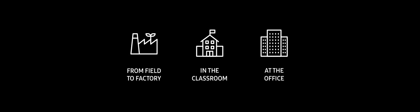 Three white icons of field to factory productivity, a school and 3 office buildings in a row in front of a black background