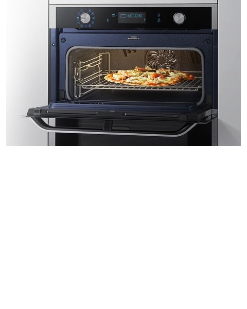Save your energy Close up photo of the top oven with the door open demonstrating energy saving features of the Dual Cook Flex