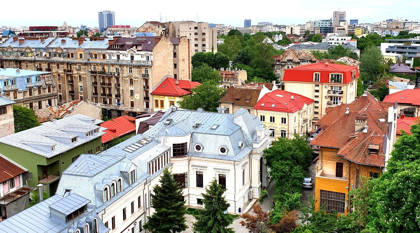Panoramic view of rooftops in Bucharest, the capital of Romania. Picture taken with Samsung Galaxy S10 shows arresting architecture and colorful houses.