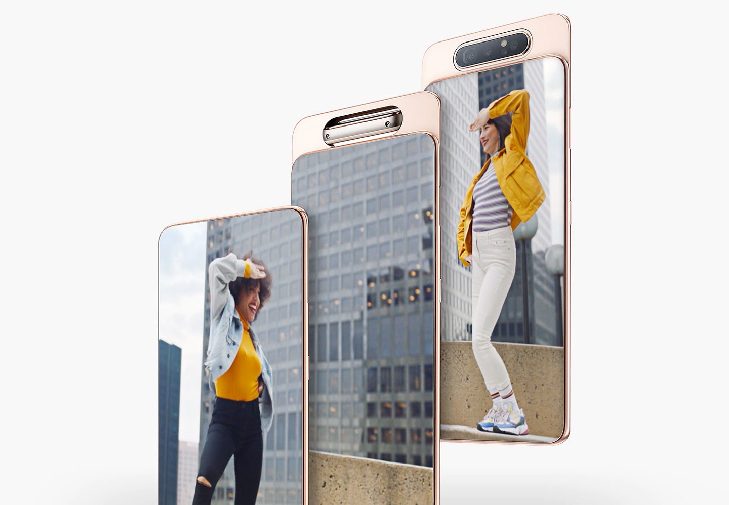 Three photos captured by Galaxy A80's Rotating Camera when it faces the rear to capture a woman dancing, then faces front to capture another woman dancing.