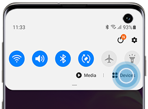 Devices is located under the Quick icons in the Notification Panel