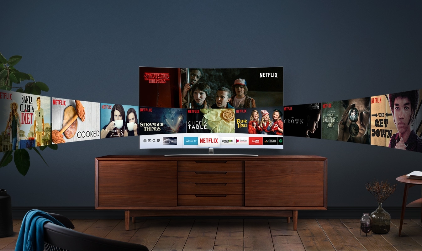 Curved screen QLED TV is placed on the wooden shelf, and various NETFLIX contents on the screen are displayed like a panorama on the screen.
