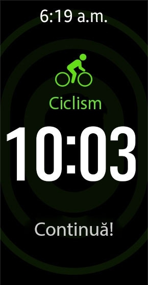 Dispozitivul Gear Fit2 monitorizează sesiunea de ciclism în modul de urmărire automată, arătând pe ecran timpul și un mesaj motivant