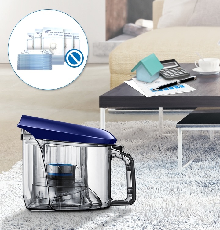 먼지봉투가 필요없다는 아이콘 표시와 함께 카펫트 위에 진공청소기 본체 왼쪽 모습이 보입니다.