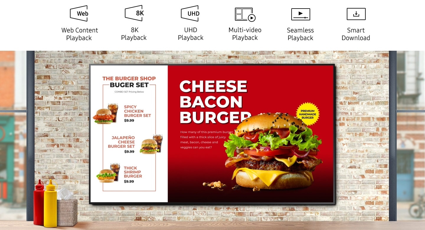 패스트푸드 매장에 설치되어 있는 사이니지 화면에 햄버거 메뉴가 보여집니다.