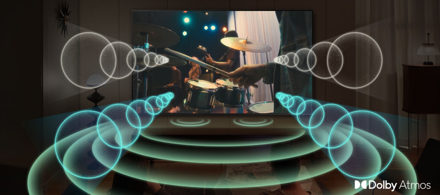 TV 화면 내 밴드가 연주하고 있는 모습이 보입니다. TV 중앙과 하단에서 음향효과가 나오는 모습이 보입니다. 오른쪽 하단에는 Dolby Atmos 로고가 보입니다.