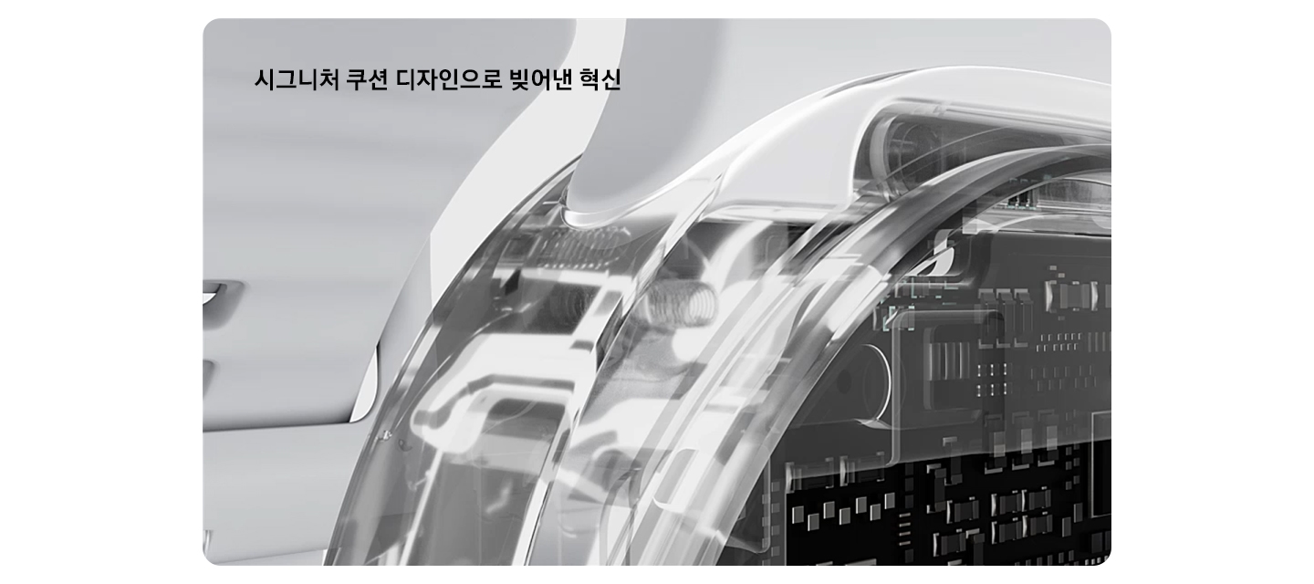 갤럭시 워치8의 한 모서리를 확대하여 쿠션 디자인을 강조합니다. 기기가 투명해지면서 내부 구성품이 드러납니다.
