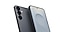 هاتفان من فئة +Galaxy S25 بلون أسود، واقفان خلف بعضهما البعض. أحدهما معروض من الخلف والآخر من الأمام.