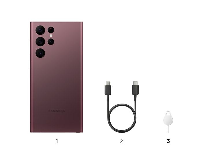 Three products stand next to one another in a row as part of the Galaxy S22 Ultra Package. The first one is a Black Galaxy S22 Ultra. The second one is a charging cable. The third one is an ejection pin. The products in a row are numbered consecutively from 1 to 3.